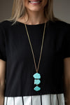 On The ROAM Again  - Gold And Turquoise Rock Necklace - Paparazzi Accessories