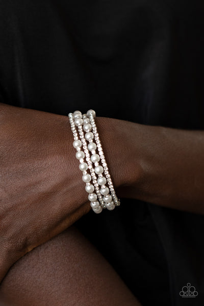 Starry Strut - White Rhinestone Coil Wrap Bracelet  - Paparazzi Accessories